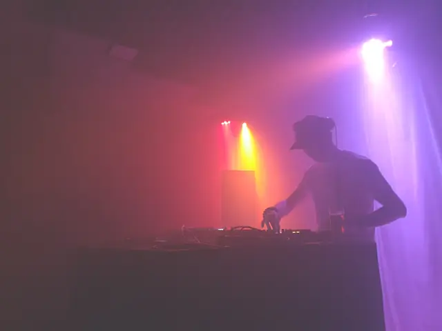 Cue.bitch behind the decks