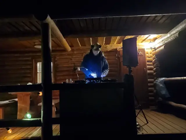 Cue.bitch behind the decks